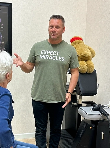 Chiropractor-Boerne-TX-Chad-Carpenter-With-Patient-Thank-You.webp thank you for your interest in Genesis Health Chiropractic